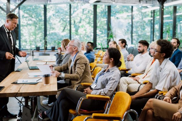 cinematic-image-of-a-conference-meeting-1-3-e1695268174241 cinematic-image-of-a-conference-meeting-1-3-e1695268174241